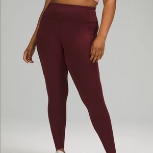 Lululemon Burgundy slightly floral design leggings (never worn)